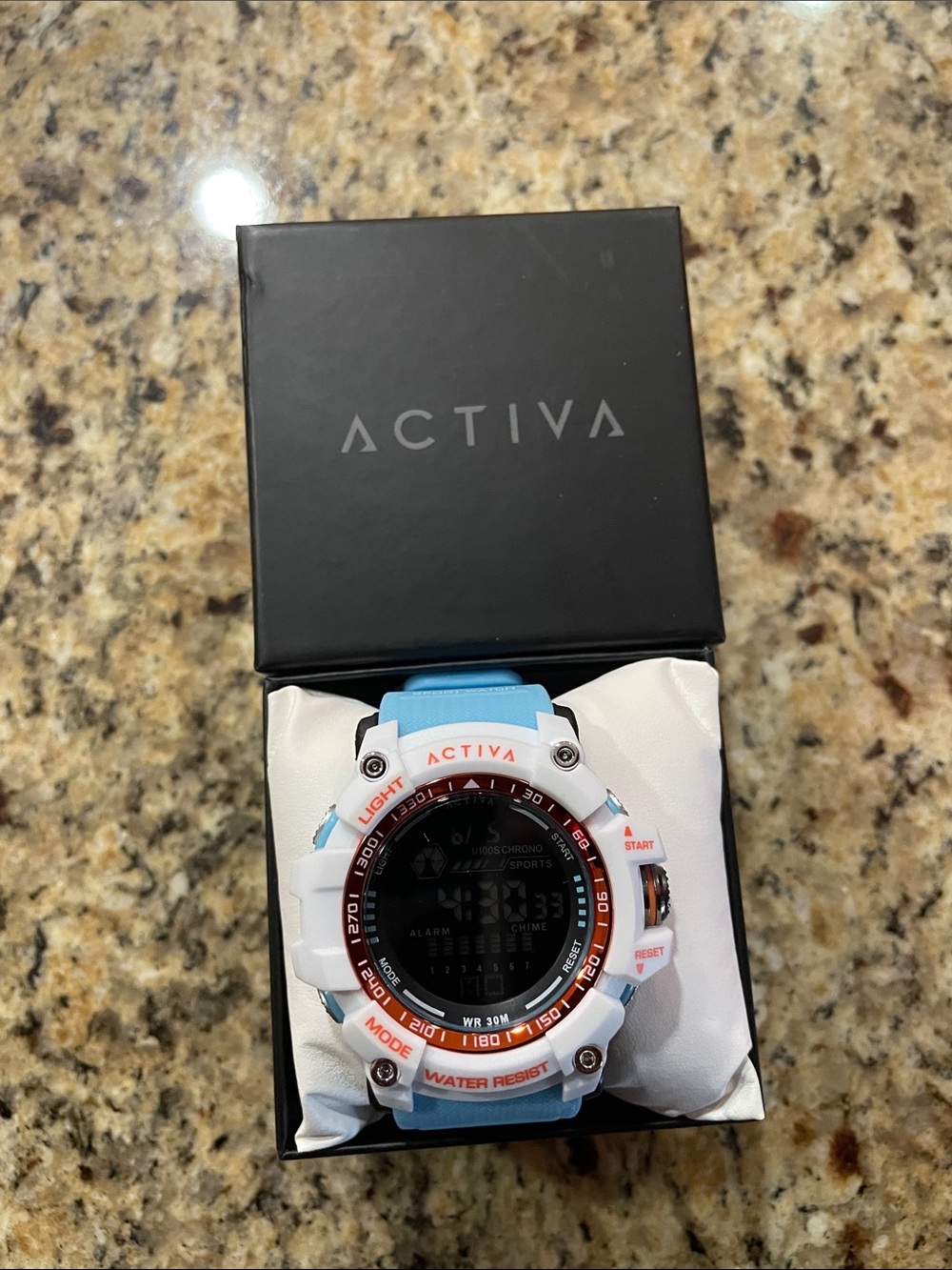 Ativa Light Blue and White Digital Sports Watch with Orange Accents